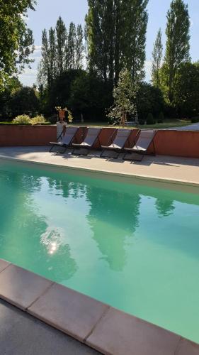 The swimming pool at or close to La Villa des Arts
