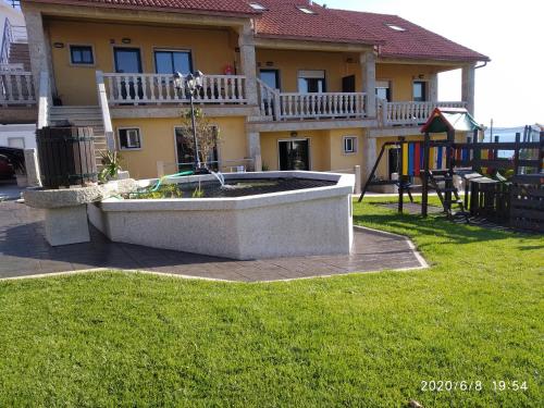 Jardín al aire libre en Apartamentos Aqualecer