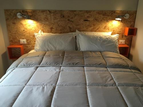 En eller flere senge i et værelse på Domus LEYDI