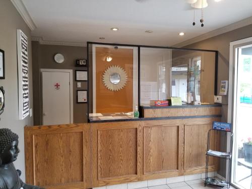 a store front with a large mirror in a room at Osoyoos Lakeview Inn & Suites in Osoyoos