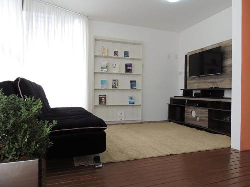 TV a/nebo společenská místnost v ubytování Positive Hostel