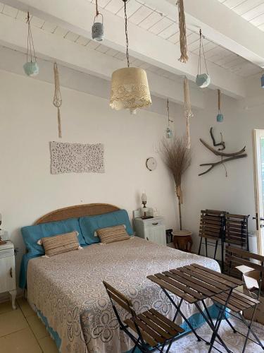 Cama o camas de una habitación en Masseria li Vecchi