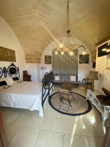 Cama o camas de una habitación en Masseria li Vecchi