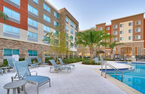 The swimming pool at or close to Holiday Inn Express & Suites - Gainesville I-75, an IHG Hotel