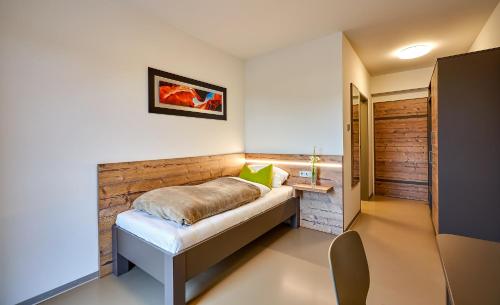 Postel nebo postele na pokoji v ubytování Huemer-Park Motel Vöcklatal