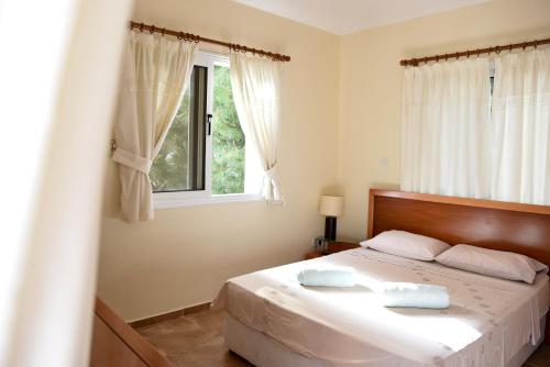 Postel nebo postele na pokoji v ubytování Exellent 3 bedroom Villa in Coral Bay