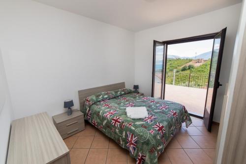 מיטה או מיטות בחדר ב-Residence Fortunato