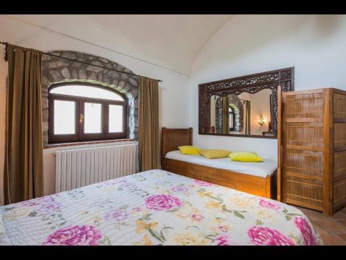 Un ou plusieurs lits dans un hébergement de l'établissement Rocca Angelica