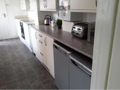 Η κουζίνα ή μικρή κουζίνα στο Alphalink house