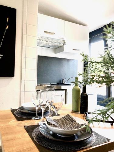 TV a/nebo společenská místnost v ubytování Résidence « Au passage coloré »