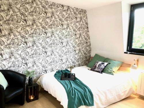 Postel nebo postele na pokoji v ubytování Résidence « Au passage coloré »