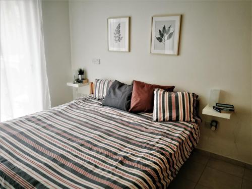 Llit o llits en una habitació de Apartment Walnut103 with pool