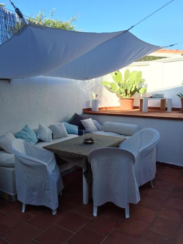 One bedroom house at Rosa Marina 20 m away from the beach with enclosed garden and wifi