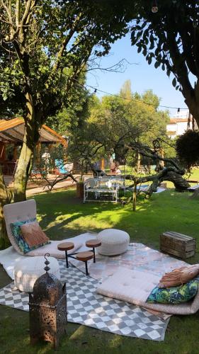 a picnic area with a table and chairs in a park at Oporto Loft in Porto