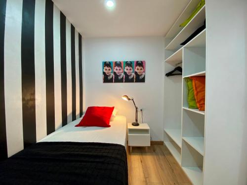 A bed or beds in a room at Besos Beach Gem II By MyRentalHost