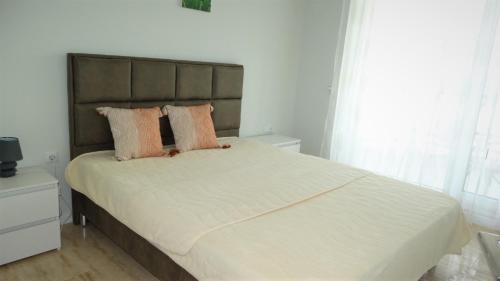 Postel nebo postele na pokoji v ubytování July's Island Deluxe