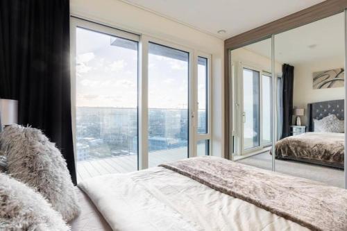 Ένα ή περισσότερα κρεβάτια σε δωμάτιο στο Luxury river side penthouse