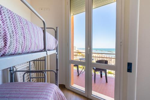 A bed or beds in a room at Residenza Casa del Sole