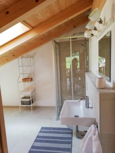 a bathroom with a sink and a mirror at Malterlehen-Berchtesgaden in Berchtesgaden