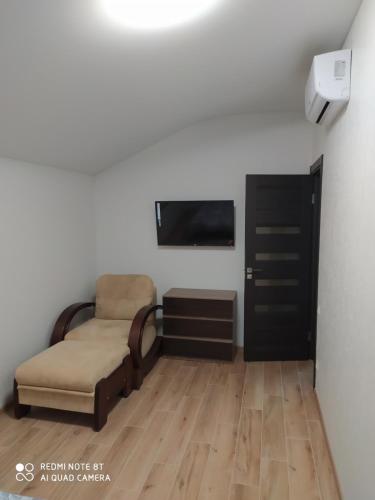 Μια τηλεόραση ή/και κέντρο ψυχαγωγίας στο REEF APARTMENTS
