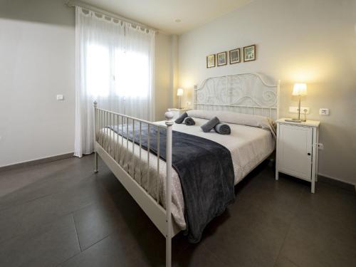 Postel nebo postele na pokoji v ubytování Casa Luz by Ĥ