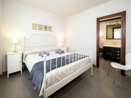 Postel nebo postele na pokoji v ubytování Casa Luz by Ĥ