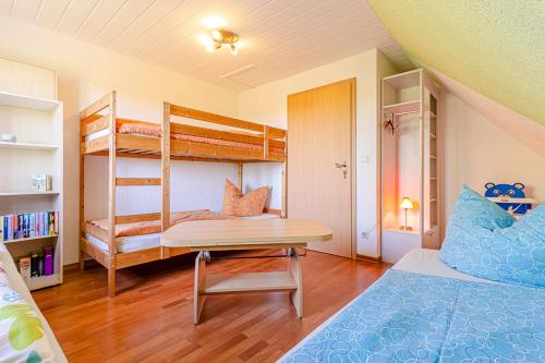Postel nebo postele na pokoji v ubytování Ferienwohnung Am Walnussbaum