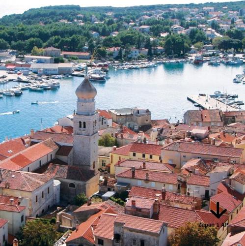 an aerial view of a town with boats in the water at Zupan 1 - apartman in Krk