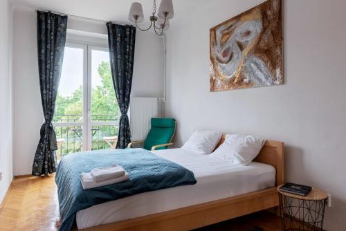 Postel nebo postele na pokoji v ubytování Two-rooms Genuine Apartment Ideal for Business Trip