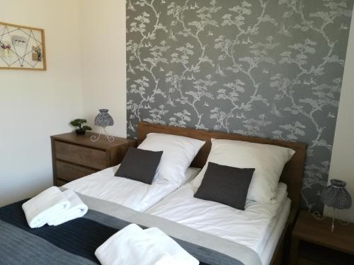 Posteľ alebo postele v izbe v ubytovaní Apartament Oaza Kołobrzeg-Podczele Kompleks Feniks basen siłownia jacuzii