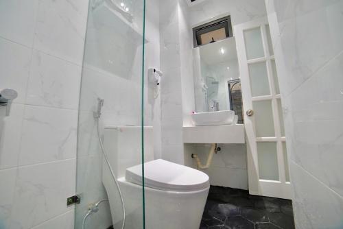 Salle de bains dans l'établissement L'amie Hotel & Studio