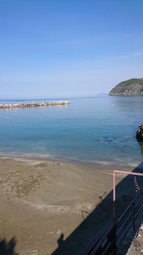 a view of a beach with a soccer goal at Affittacamere Rosa Dei Venti in Levanto