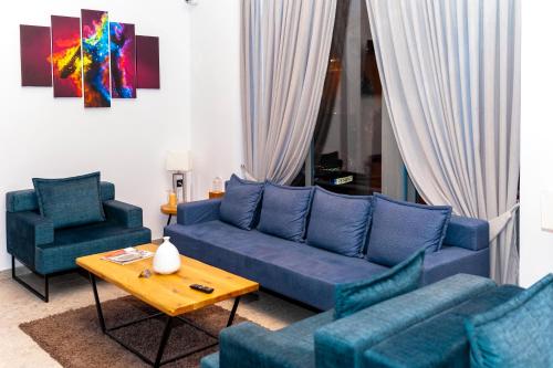 Posezení v ubytování Meni Hotel & Apartments