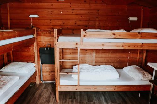 Двухъярусная кровать или двухъярусные кровати в номере Lyngmo Hytter