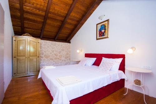 Ένα ή περισσότερα κρεβάτια σε δωμάτιο στο EASY HOLIDAY