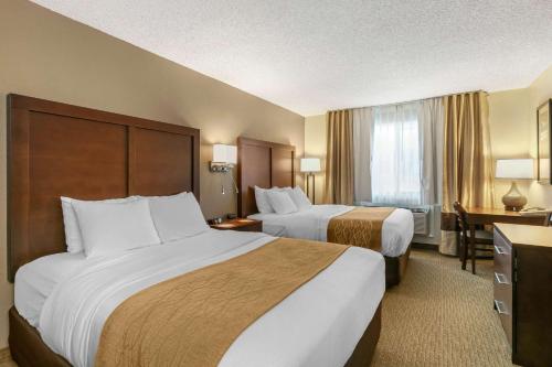 เตียงในห้องที่ Comfort Inn Worland Hwy 16 to Yellowstone