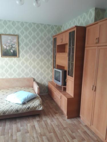 Ένα ή περισσότερα κρεβάτια σε δωμάτιο στο Гостевой дом