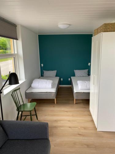 Postel nebo postele na pokoji v ubytování Aa Strand Camping