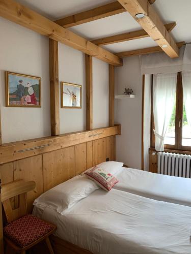 Postel nebo postele na pokoji v ubytování Hotel Capriolo