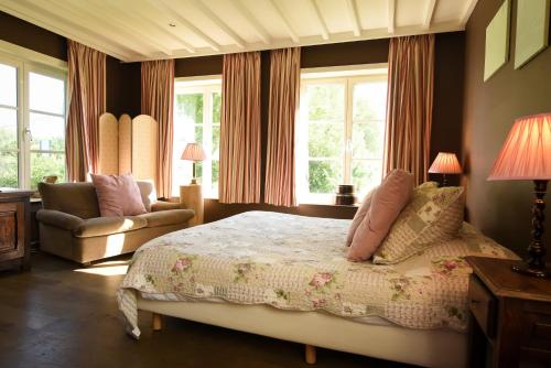 En eller flere senge i et værelse på Hotel Ter Polders