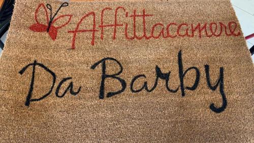 a towel with the words bartotechnology da baroda on it at Affittacamere da Barby in Rome