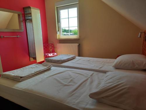 Postel nebo postele na pokoji v ubytování Holiday Home Mooi - Voeren