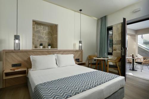 Postel nebo postele na pokoji v ubytování Casa D'Irene Deluxe Hotel