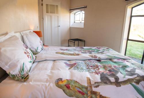 
Een bed of bedden in een kamer bij Boerenhofstede de Overhorn
