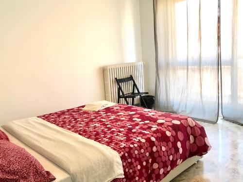Ένα ή περισσότερα κρεβάτια σε δωμάτιο στο ROOM 110 BARI -guesthouse-