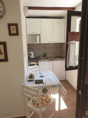 Kuchyň nebo kuchyňský kout v ubytování Stana Apartment