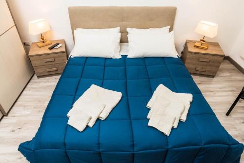 Un pat sau paturi într-o cameră la La Casa del Poeta