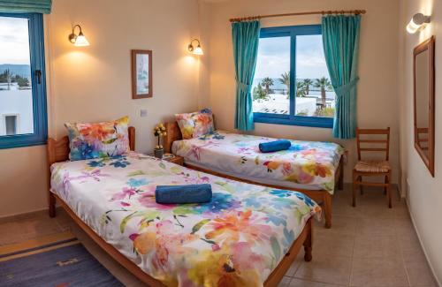 Postel nebo postele na pokoji v ubytování Penthouse direkt am Meer
