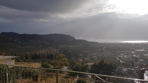 a view of a valley with a mountain in the background at Iliothea in Nafplio
