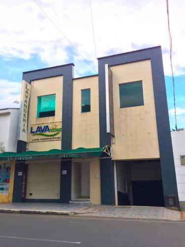 a building on the side of a street at NOA Hotel Boutique in Tuluá